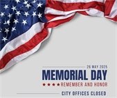 A photo of an American flag that says City offices are closed Monday, May 26.