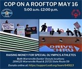 A photo of Warrenville Police on the roof of Dunkin to raise money for Special Olympics.