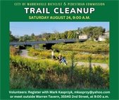 A photo of a group of volunteers cleaning up the DuPage River Trail to promote the August 24 cleanup day.