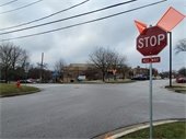 A photo of one of the new stop signs installed at the intersections of Curtis Avenue/Tracy Place/Warren Avenue and Manning Avenue/Warren Avenue.