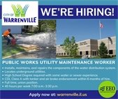 Graphic with the City of Warrenville logo and the headline “We’re Hiring!” above two photos: a Public Works employee opening a fire hydrant to flush water along a curb and the Warrenville Public Works building with an American flag in front. Text reads “Public Works Utility Maintenance Worker” with bullet points listing duties and qualifications, including installing and repairing water distribution components, locating underground utilities, high school degree required with some water or sewer experience, CDL Class A with tanker and air brake endorsement within six months of hire, full-time union position, and 40-hour work week from 7:00 a.m. to 3:30 p.m. Footer text reads “Apply now at warrenville.il.us” with an Equal Opportunity Employer symbol.