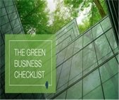 An image of a building reflecting green tree leaves to promote a Green business initiative.