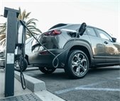 A photo of an electric vehicle with information about EVs in Illinois.