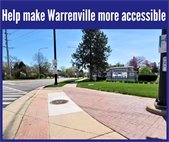 A sidewalk in the City promoting the City's efforts to make streets and sidewalks more accessible.