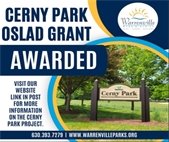 A photo of Cerny Park with information about the second Oslad grant received for park improvements.