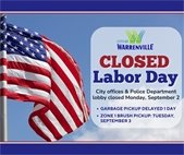 A photo of an American flag for Labor Day when City Hall offices are closed Monday, September 2.