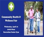 A photo of a man and woman pushing their bikes to promote the Community Health Fair April 10.