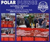 A photo of police participating in the Polar Plunge to raise money for Special Olympics.